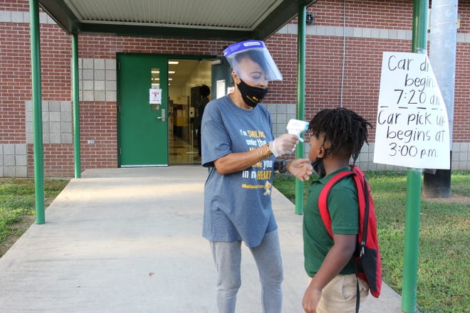 Teachers at Madison James Foster Elementary in Monroe welcomed students to the first day of class on Aug. 26 with precautions in place to reduce the spread of COVID-19.