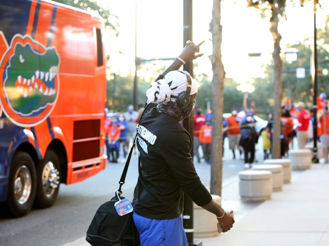 Florida Gators receiver Kadarius Toney (1) waves to the Gator fans after the team got off the bus before a football game against Arkansas at Ben Hill Griffin Stadium in Gainesville, Fla. Nov. 14, 2020.   [Brad McClenny/The Gainesville Sun]