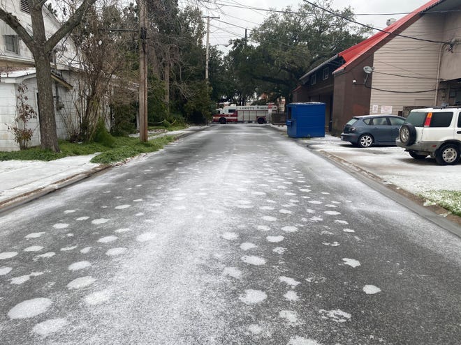 Low temperatures overnight leaves a neighborhood around the University of Louisiana at Lafayette covered in snow and ice Monday morning, Feb. 15, 2021.