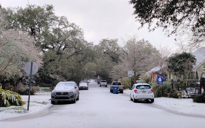 Snow and ice blankets the neighborhood around Myrtle Place Elementary School in Lafayette Monday morning, Feb. 15, 2021.