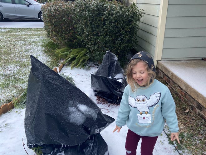 Emilia Aucoin plays in rare Louisiana snow in Lafayette on Monday, Feb. 15, 2021.