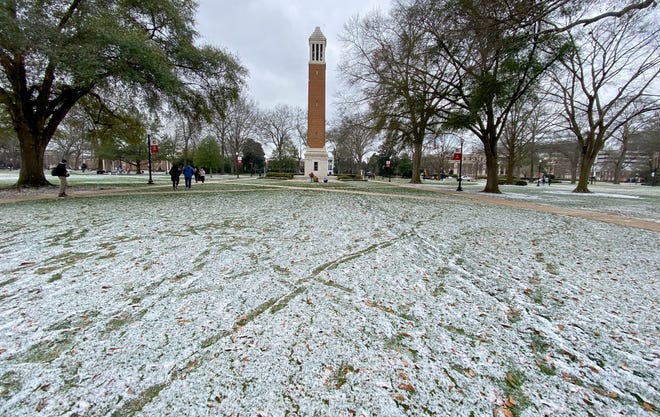 A light covering of snow dusts the Quad at the University of Alabama near Denny Chimes Tuesday, Feb. 16, 2021. [Staff Photo/Gary Cosby Jr.]