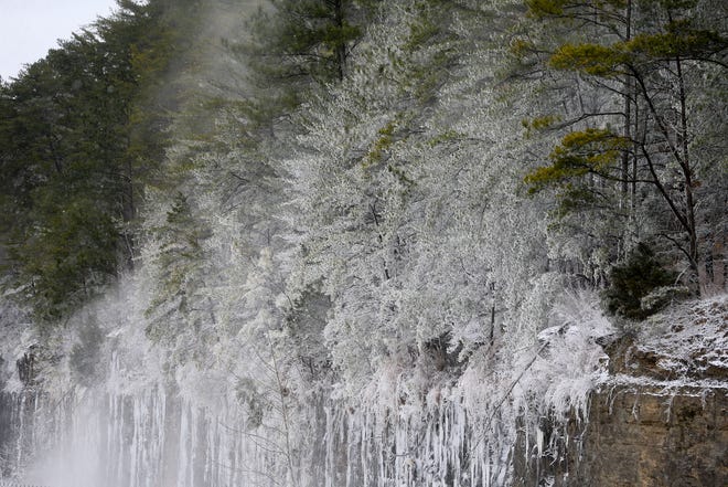 Ice and snow coat the cliffs above the Lake Tuscaloosa overflow Tuesday, Feb. 16, 2021. [Staff Photo/Gary Cosby Jr.]