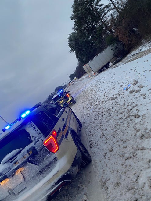 The Tennessee Highway Patrol said it responded to a jack-knifed tractor-trailer in Robertson County, just before the Kentucky border on Tuesday. Roads remained icy after a winter storm moved through Monday and overnight.