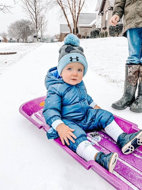 Graham Whitaker goes sledding in Franklin, Tenn. after a winter storm on Tuesday, Feb. 16, 2021.