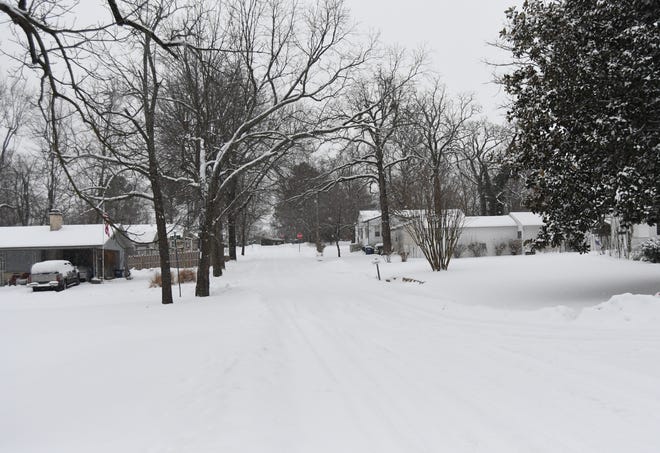 Mountain Home residents woke up Wednesday morning to find an additional 2.5 inches of snow on the ground.